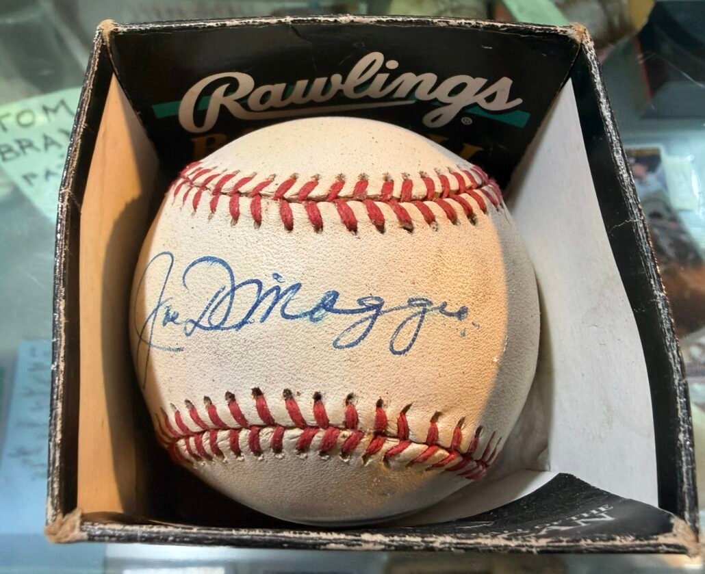 Autographed Joe DiMaggio baseball, sports memorabilia